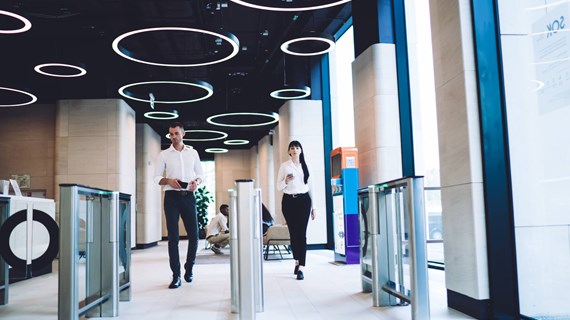 Confident coworkers passing checkpoint at workplace (320550253)_Large.jpeg (235.6 KB)